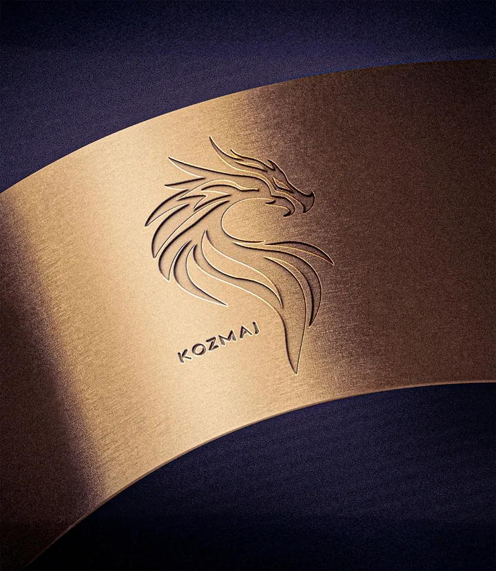 Kozmaj logo embossed on a gold band